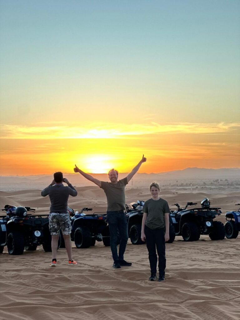 Agafay Desert vs Merzouga: quad bikes at sunset in the stony Agafay Desert near Marrakech