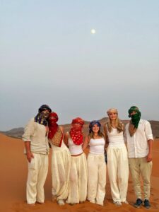 Student group camel trekking in the Sahara Desert, Morocco