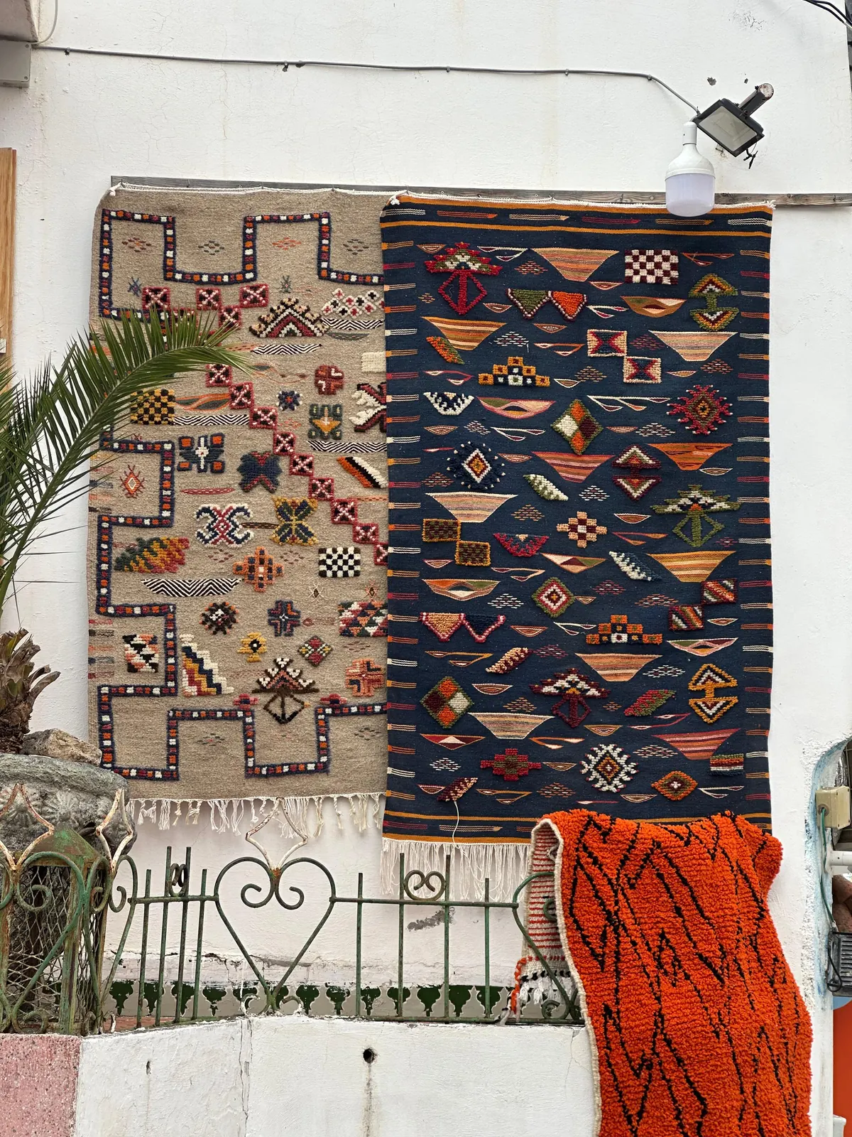 Handwoven Berber carpets on display in Morocco