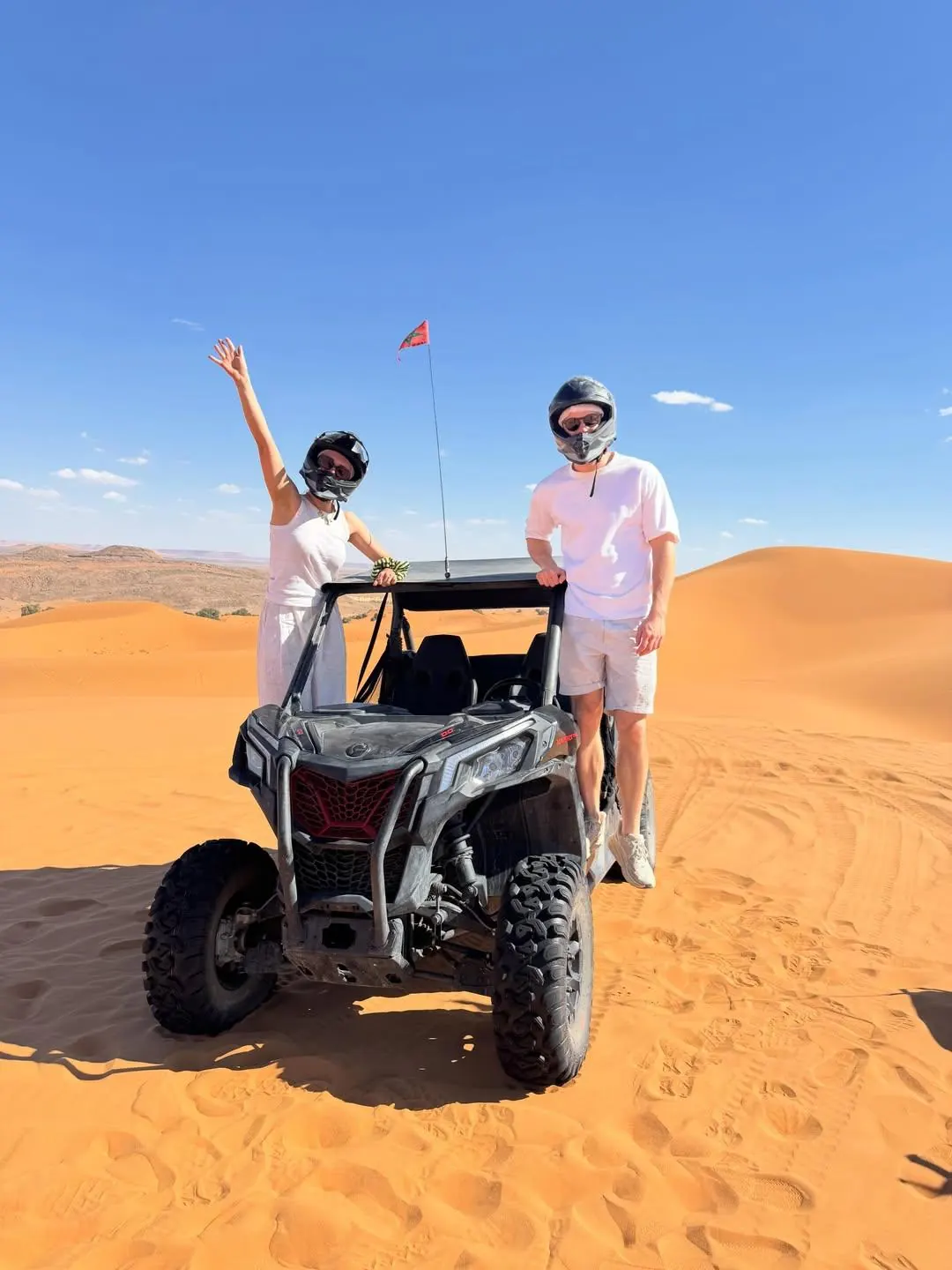 Travelers with a buggy on the Erg Chebbi dunes