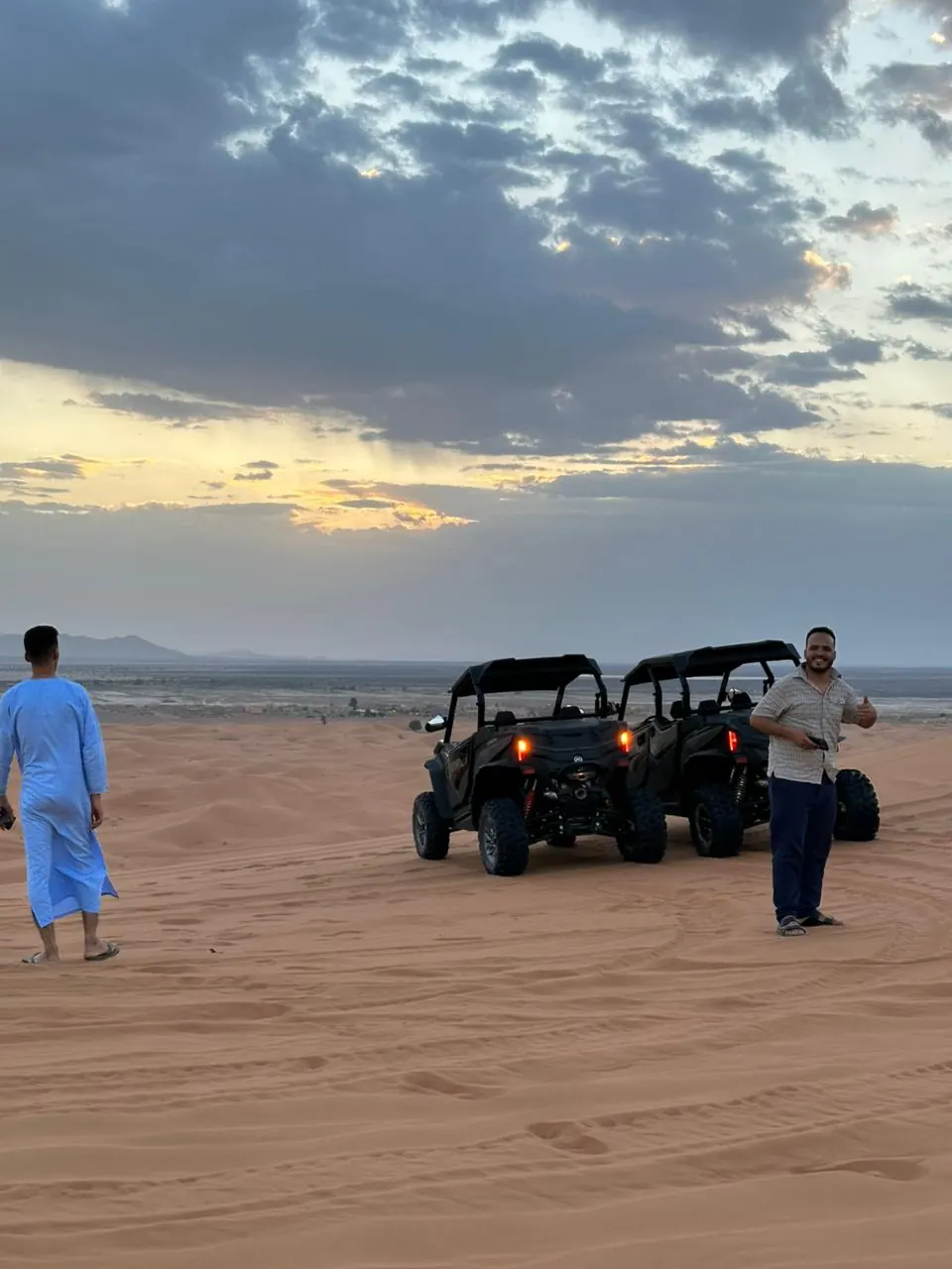 Buggies on the Merzouga desert at sunset