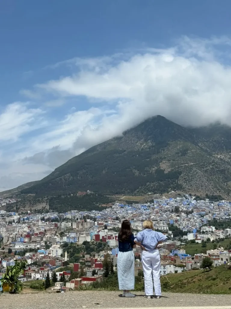 Our travelers at a viewpoint over Chefchaouen, a stop on a 7 days in Morocco itinerary
