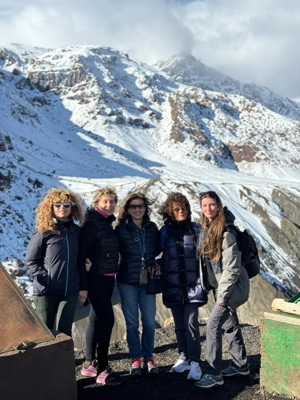 Group of travelers in the snowy High Atlas Mountains