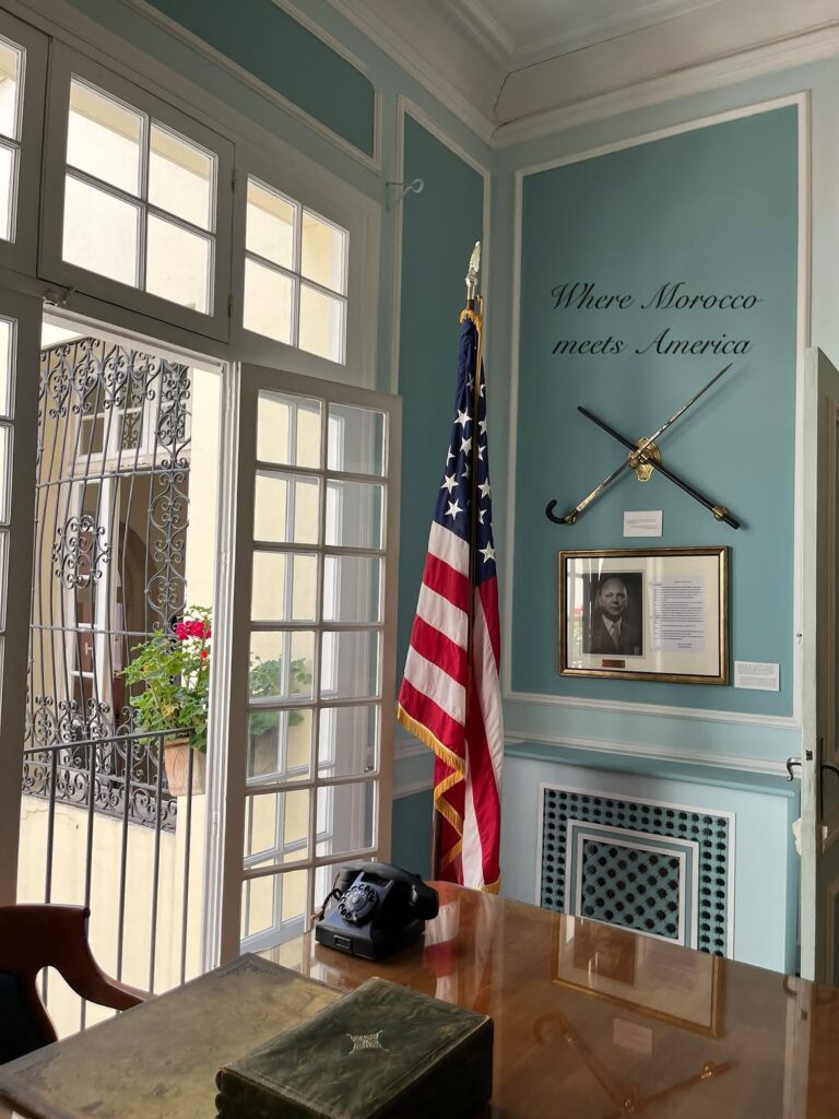 Tangier American Legation room with the US flag and the words Where Morocco meets America, a reminder that Morocco was the first country to recognize the United States