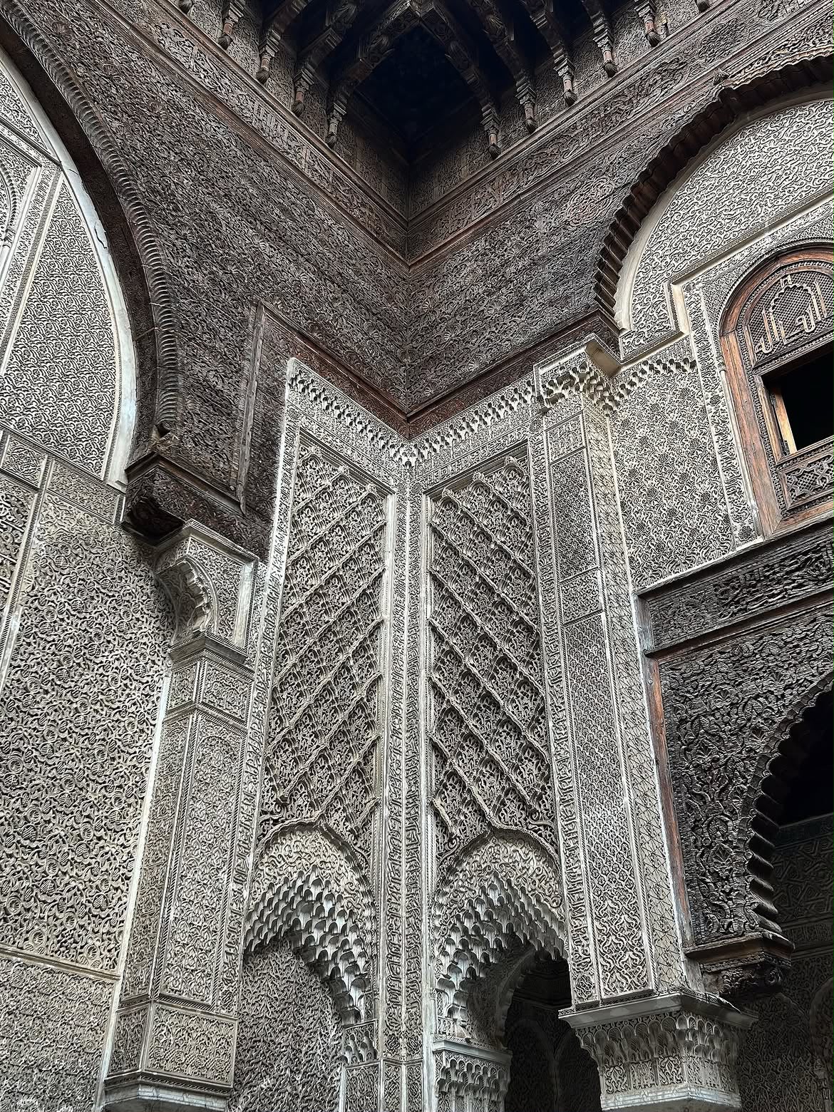 Carved plaster and wood in a madrasa in Fes