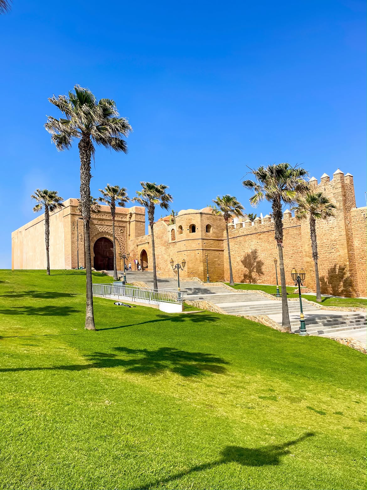 Palm trees and a garden below the walls of the Kasbah of the Udayas in Rabat