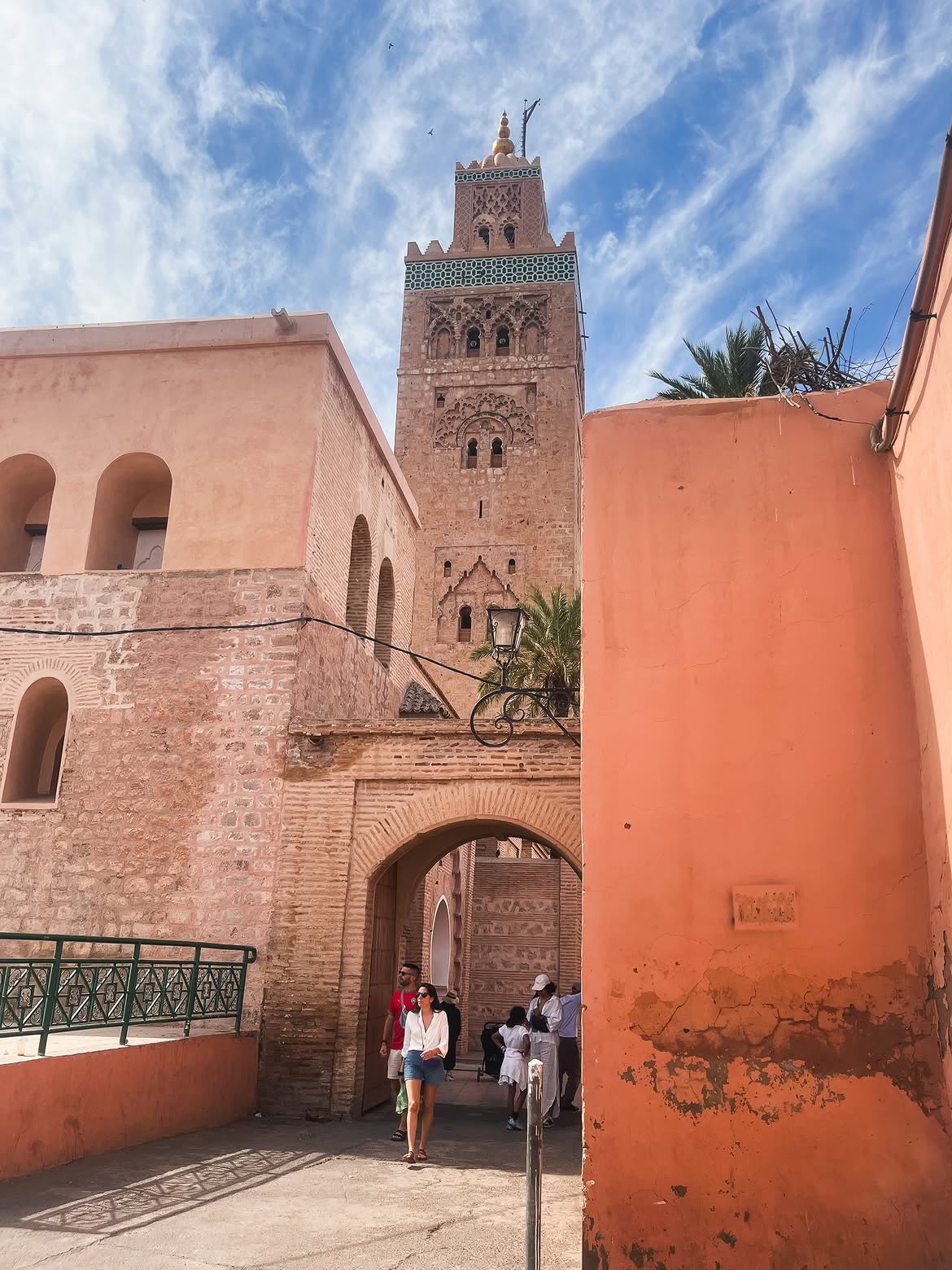 The Koutoubia minaret rising above a medina archway in Marrakech