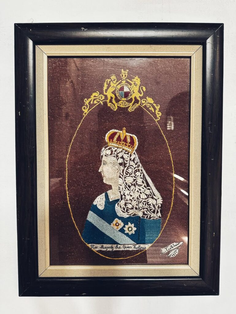 Embroidered portrait of Queen Victoria hanging inside St Andrew's Church in Tangier