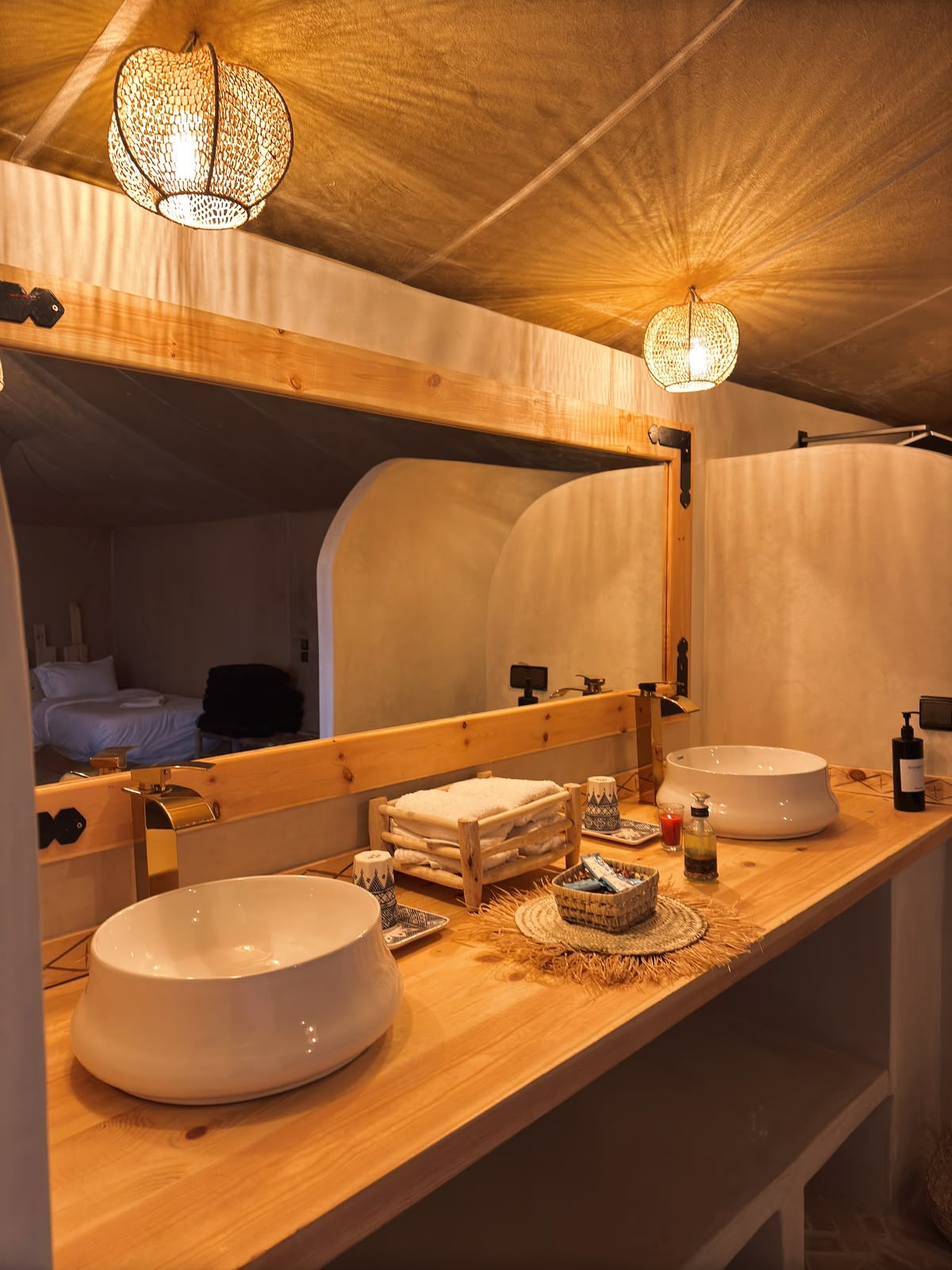 En-suite bathroom with a double sink inside a luxury desert camp tent